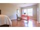 Bedroom corner with hardwood floors and window seating at 342 Holbrook Rd, Smyrna, GA 30082