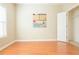 Simple bedroom with hardwood floors and neutral walls at 342 Holbrook Rd, Smyrna, GA 30082