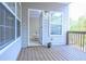 Outdoor deck with view to sitting room through glass door, enhancing indoor-outdoor living at 342 Holbrook Rd, Smyrna, GA 30082