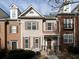 Charming townhouse with brick facade, copper roof accents, and a welcoming front porch at 342 Holbrook Rd, Smyrna, GA 30082