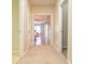 Hallway with carpet and open doorway to the primary bedroom at 342 Holbrook Rd, Smyrna, GA 30082