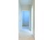 Hallway with white carpet and white trim leading to another room at 342 Holbrook Rd, Smyrna, GA 30082