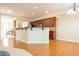 Kitchen with breakfast bar and hardwood floors at 342 Holbrook Rd, Smyrna, GA 30082