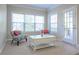 Cozy living room with natural light, two chairs, and a white coffee table at 342 Holbrook Rd, Smyrna, GA 30082