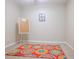 Spacious playroom with colorful rug and whiteboard at 342 Holbrook Rd, Smyrna, GA 30082