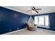 Bedroom with bay window and dark blue walls at 4620 Sammy Dr, Powder Springs, GA 30127