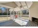 Relaxing screened porch with ceiling fan and built in fireplace at 4620 Sammy Dr, Powder Springs, GA 30127