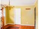 Dining room with tiled floors and brass chandelier at 4751 Brownsville Rd, Powder Springs, GA 30127