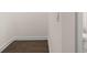 Small bathroom with hardwood floors and neutral walls at 13553 Whitman Se Ln, Covington, GA 30014