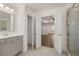 Bathroom with access to bedroom and walk-in shower at 13553 Whitman Se Ln, Covington, GA 30014