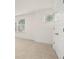 Bright bedroom with neutral walls, carpet, and window at 13553 Whitman Se Ln, Covington, GA 30014