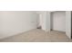 Bright bedroom with carpet flooring and double closets at 13553 Whitman Se Ln, Covington, GA 30014