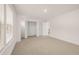 Spacious bedroom with large closet and window at 13553 Whitman Se Ln, Covington, GA 30014