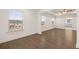 Bright bedroom with hardwood floors and multiple windows at 13553 Whitman Se Ln, Covington, GA 30014