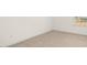 Simple bedroom with neutral walls and carpet flooring at 13553 Whitman Se Ln, Covington, GA 30014