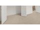 Bright bedroom with neutral walls, carpet and closet at 13553 Whitman Se Ln, Covington, GA 30014