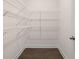 Walk-in pantry with wire shelving at 13553 Whitman Se Ln, Covington, GA 30014