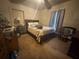 Bedroom featuring a bed, nightstand, and standard furnishings at 3453 Woodlawn Cir, Tucker, GA 30084
