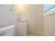 A half bathroom with a modern vanity and toilet at 1658 Hollyhock Ter, Decatur, GA 30032