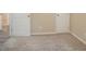 This carpeted bedroom has neutral walls and white trim at 1658 Hollyhock Ter, Decatur, GA 30032