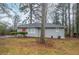 Cozy single-story home with a bright red door and well-maintained landscaping at 1658 Hollyhock Ter, Decatur, GA 30032