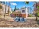 House exterior with deck and fire pit area at 4290 Valley Trail Se Dr, Atlanta, GA 30339