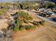 Aerial view of vacant lot with mature trees at 5422 Hill Sw Rd, Powder Springs, GA 30127