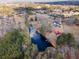Aerial view of a property with lake, dock, trees, and surrounding neighborhood at 5422 Hill Sw Rd, Powder Springs, GA 30127