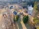 Aerial view of a home and pond at 5422 Hill Sw Rd, Powder Springs, GA 30127
