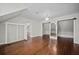 Bonus room with hardwood floors, closet and additional closet behind a mirror at 5422 Hill Sw Rd, Powder Springs, GA 30127