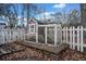 This chicken coop is conveniently fenced for easy access and safety for your chickens at 5422 Hill Sw Rd, Powder Springs, GA 30127