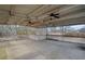 Spacious covered deck features ceiling fans and string lights, perfect for outdoor entertaining at 5422 Hill Sw Rd, Powder Springs, GA 30127