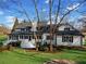 Beautiful multi-story home with a covered porch and landscaped front yard at 5422 Hill Sw Rd, Powder Springs, GA 30127