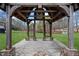 Elegant gazebo with exposed rafters and decorative windows, offering a tranquil outdoor escape at 5422 Hill Sw Rd, Powder Springs, GA 30127