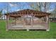 Wooden gazebo with metal roof providing outdoor space at 5422 Hill Sw Rd, Powder Springs, GA 30127