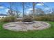 Landscaping with a unique hardscape element adds charm to this home's outdoor space at 5422 Hill Sw Rd, Powder Springs, GA 30127