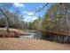 Serene pond with dock and geese at 5422 Hill Sw Rd, Powder Springs, GA 30127