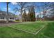 Large manicured yard with a wood planter. House is partially visible in the background at 5422 Hill Sw Rd, Powder Springs, GA 30127