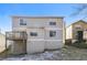 Spacious backyard view features a deck and multi-story home at 5541 Panola Pl, Lithonia, GA 30058