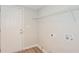 Clean laundry room with shelving and utility connections at 5541 Panola Pl, Lithonia, GA 30058