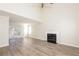 Bright living room featuring high ceilings, fireplace, and sliding glass door to outdoor patio at 5541 Panola Pl, Lithonia, GA 30058