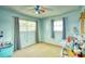 Light and airy bedroom with carpet flooring at 981 Meadowbrook Nw Ln, Conyers, GA 30012