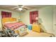 Spacious bedroom with ample natural light and carpet flooring at 981 Meadowbrook Nw Ln, Conyers, GA 30012