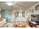 Spacious living room with access to dining area at 981 Meadowbrook Nw Ln, Conyers, GA 30012