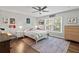 Bright bedroom featuring hardwood floors and ample natural light at 1130 Edgewater Dr, Atlanta, GA 30328