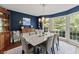 Elegant dining room with a marble table and ample natural light at 1130 Edgewater Dr, Atlanta, GA 30328