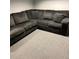 Finished basement with sectional sofa at 1221 Martin Nash Sw Rd, Lilburn, GA 30047