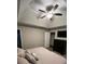 Spacious primary bedroom with high ceilings and ceiling fan at 1221 Martin Nash Sw Rd, Lilburn, GA 30047