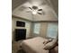 King-size bed in this well-lit bedroom with high ceilings at 1221 Martin Nash Sw Rd, Lilburn, GA 30047