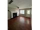 Living room with hardwood floors and fireplace at 1221 Martin Nash Sw Rd, Lilburn, GA 30047